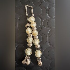 Worry beads, or komboloi, Glass with gold flecks 
and Silver